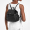 Mochila Michael Kors Merrit de piel granulada negra