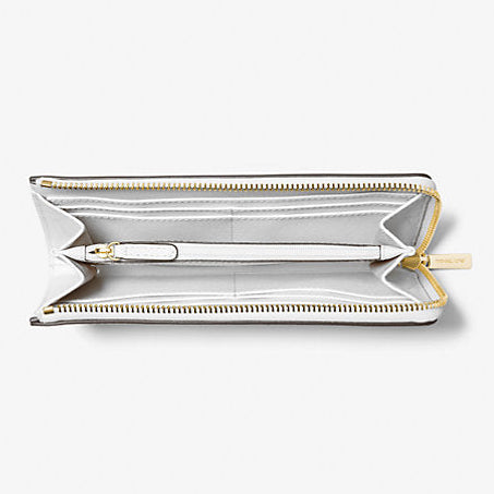 Billetera Michael Kors Jet set Travel grande cuero saffiano blanca