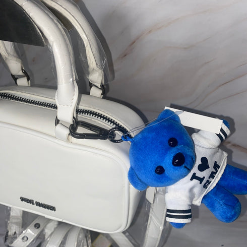 Crossbody Steve Madden BKrush small con osito colgante blanco