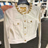Chaqueta dennin blanca Michael Kors detalles Gold