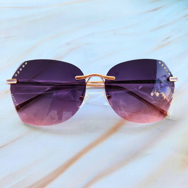 Lentes de Sol GUESS con estuche purpura