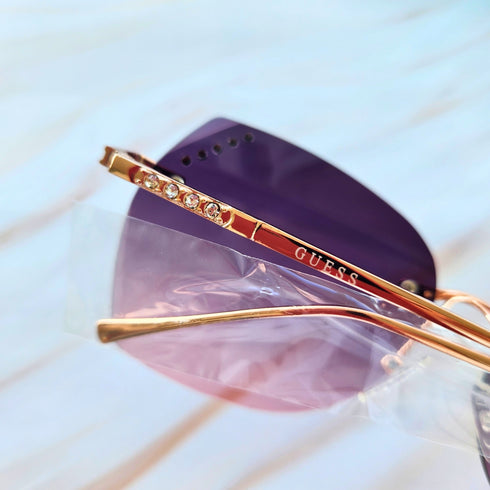 Lentes de Sol GUESS con estuche purpura
