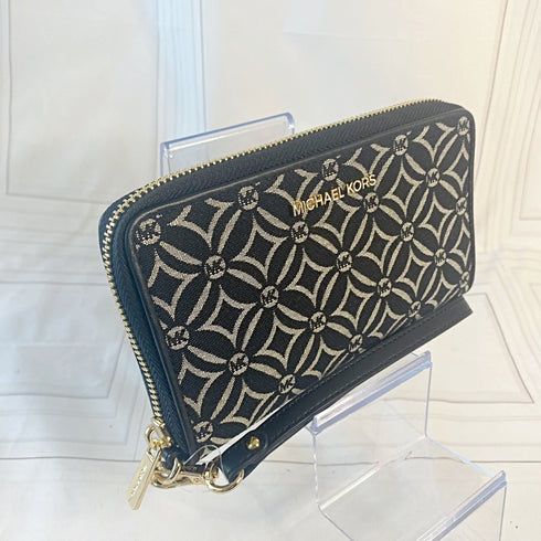 Billetera y cartera de mano Michael Kors modelo Jet Set