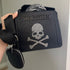 Cartera Evelyn Steve Madden crossbody calavera