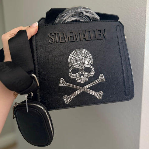 Cartera Evelyn Steve Madden crossbody calavera