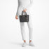 Tote Michael Kors Jet Set Travel XS negro logo monograma