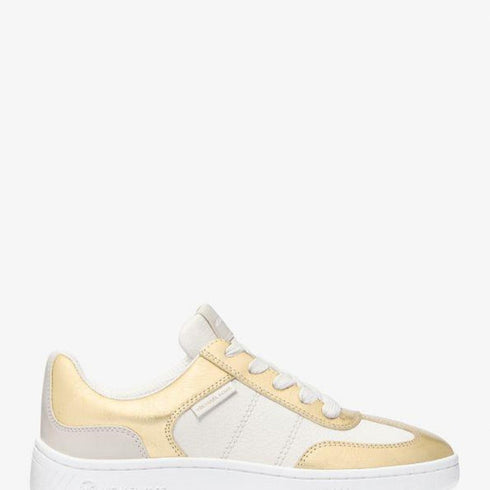 Zapatilla Michael Kors Kai metalic gold cuero