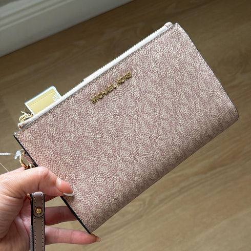 Billetera Michael Kors Jet Set Travel logo rosado (reserva por whatsapp)