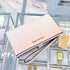 Cartera de mano y billetera Michael Kors Jet Set porta telefono logo monograma rosa