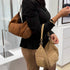 Cartera Michael Kors Merritt mediano convertible de gamuza lugagge