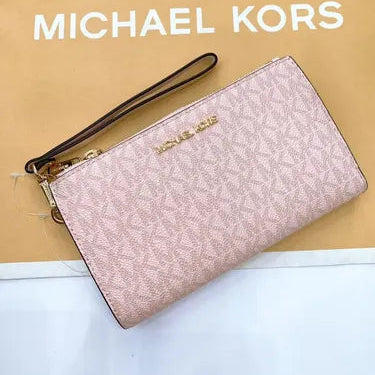 Billetera Michael Kors Jet Set Travel logo rosado (reserva por whatsapp)