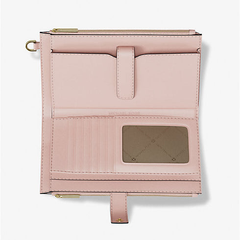 Cartera de mano y billetera Michael Kors Jet Set porta telefono logo monograma rosa