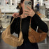 Cartera Michael Kors Merritt mediano convertible de gamuza lugagge